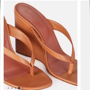 AMINA MUADDI
Johana Leather Thong Wedge Sandals- size 38